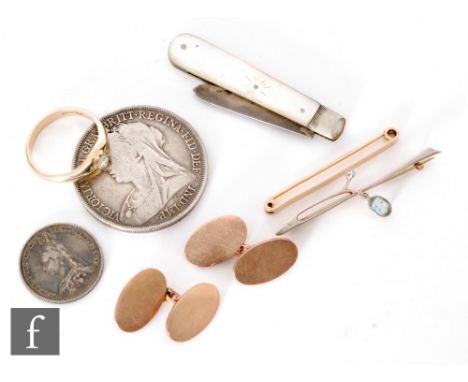 A pair of 9ct hallmarked cufflinks with a 9ct tie pin and a 9ct paste set ring, total weight 18g, an aquamarine and diamond b