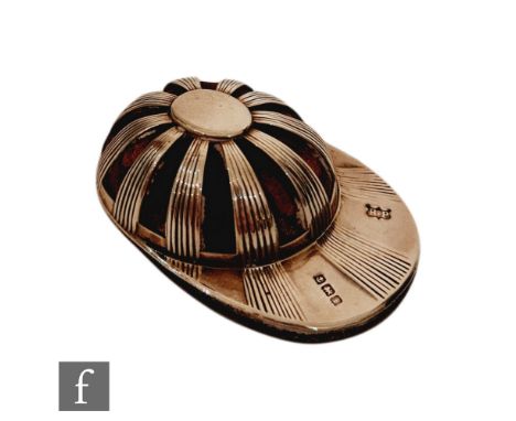 A silver hallmarked pin cushion modelled as a jockey cap, Birmingham 1908, Robert Pringle &amp; Sons, width 6cm, S/D. 