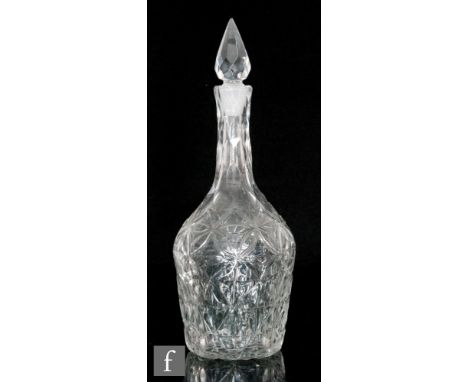A late 18th Century decanter circa 1780, the Indian Club form body with flat cut decoration beneath a facet cut neck and matc