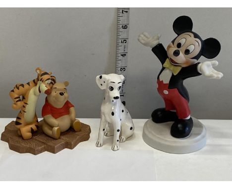 Three assorted Disney ceramic figures 