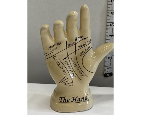 A palm readers ceramic hand 