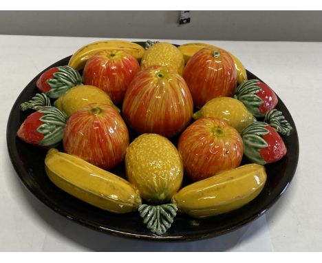 A Majolica style ceramic fruit bowl 