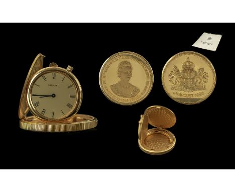 18 CARAT GOLD GARRARD &amp; CO LIMITED EDITION COMMEMORATIVE COIN WATCH A gold commemorative coin watch, commemorating the 80