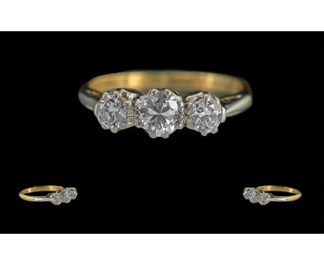Ladies 18ct Gold 3 Stone Diamond Set Ring, marked 18ct and Platinum to interior of shank.  The three round faceted diamonds o