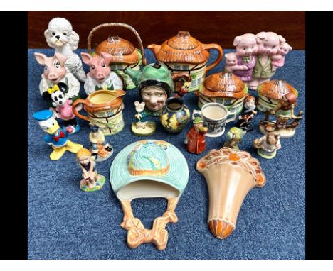 Box of Miscellaneous, to include Cottageware five piece tea set, Beswick character jug, two Wade Nat West Piggy Banks, Hummel
