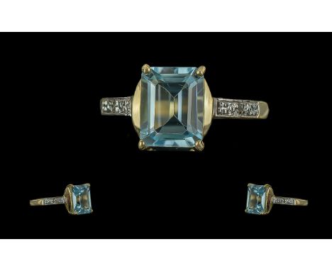 Ladies 9ct Gold Pleasing Blue Topaz and Diamond Set Ring. Full Hallmark to Interior of Shank. The Topaz of Good Colour / Clar