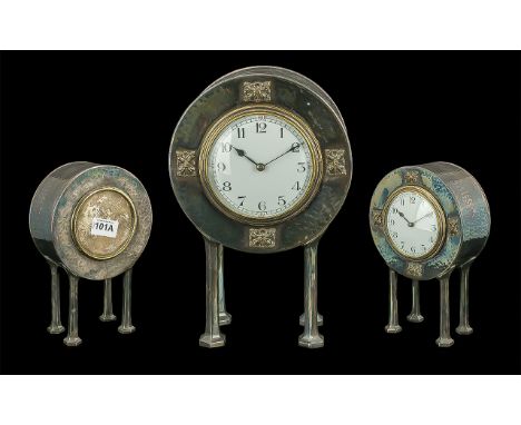Art Nouveau Excellent Planished Silver Plated and Key Wind Mantel Clock of Round Form. Raised on 4 Stylish Legs with Superb B