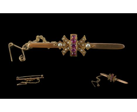 Victorian Period 1837 - 1901 Ladies Exquisite 9ct Gold Ruby and Seed Pearl Set Brooch with Safety Chain. Marked 9ct. The Rubi