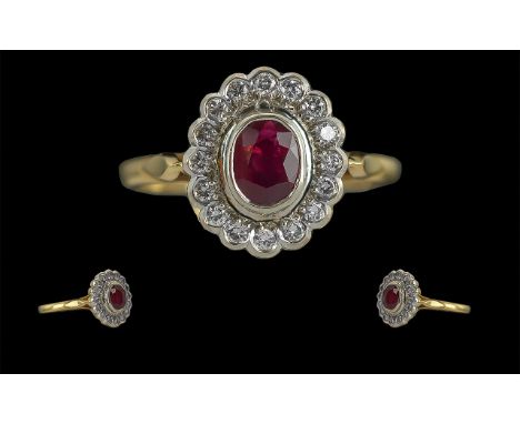 Ladies Superb 18ct Gold Ruby and Diamond Set Cluster Ring, full hallmark to interior of shank, the central ruby of good colou