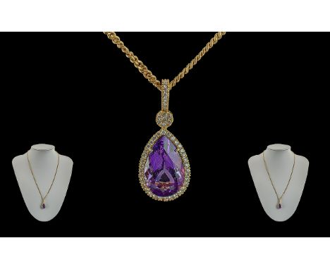 18ct Gold Excellent Quality Diamond and Amethyst Set Pearl Shaped Pendant Attached to a 18ct Gold Curb Chain. Marked 18ct. Th