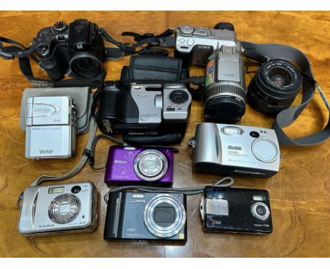 Collection of Cameras, including Kodak, Sony, Vivitar, Casio, Vivicam, Nikon Coolpix, Finepix, etc.