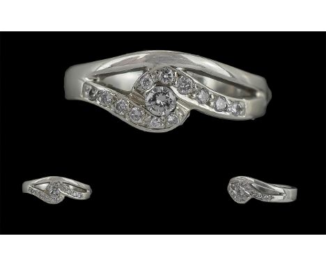 Ladies 18ct White Gold Contemporary Diamond Set Dress Ring, marked 750 to interior of shank, the brilliant cut diamond of exc