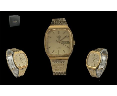 Rotary Gentleman's Automatic Wristwatch, Gold tone, gold face with baton numerals, date aperture.  25 jewels.  Boxed, with bo
