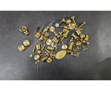 Collection of Miniature Brass Items, including pots, buckets, lamps, spinning wheel, globe, bed pan, cannon, lidded pots and 