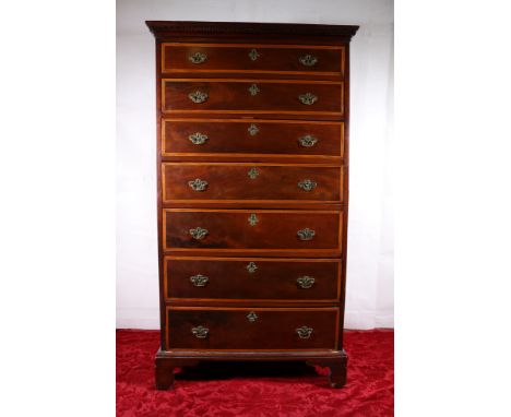 Victorian mahogany inlaid seven graduated drawer chest with Greek key cornice, raised on bracket supports. 