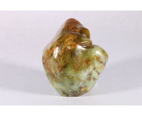 A Chinese hardstone boulder or scholar's stone in mottled green and brown hardstone, 15.5 cm x 14 cm. 