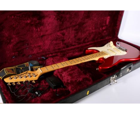 De Ville electric guitar in hard carry case. Light scratches in places.  No bar present.