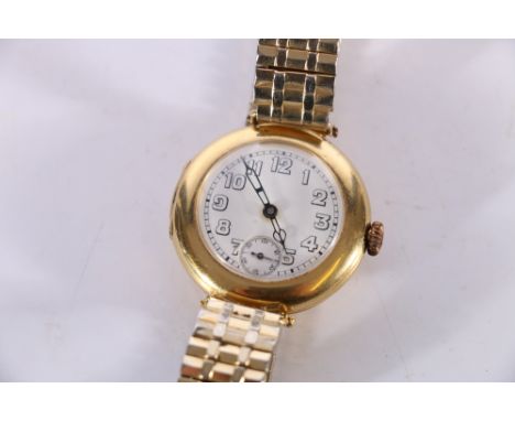 18ct gold cased Longines mechanical wristwatch with 16 jewel movement, white enamel dial with subsidiary seconds on plated Sp