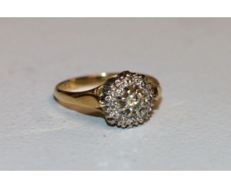 18ct gold diamond cluster ring, makers mark HS, Birmingham, 3.68g 