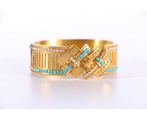 Late Victorian unhallmarked yellow metal turquoise and seed pearl bangle 35g gross. All stones present and ok.  Burn/tarnish 