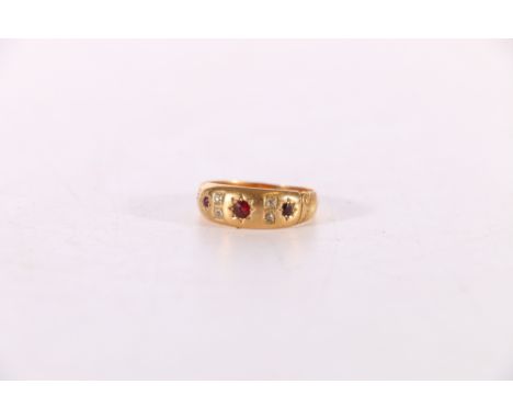 18ct gold ruby and diamond dress ring, size P, 4g. 18ct hallmarks.  Misshapen, marks rubbed.