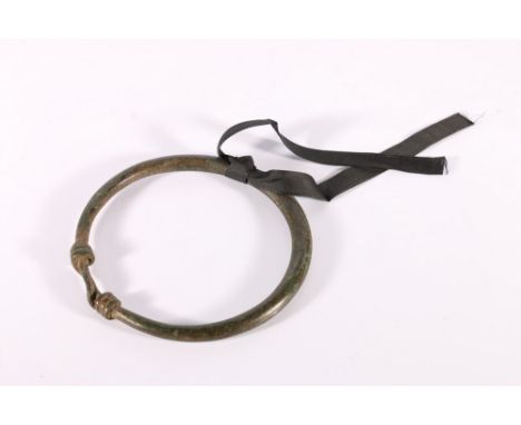 Antique heavy bronze circular ring with twisted ends to secure, possibly African, 15cm. 