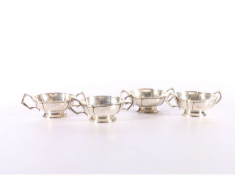 Set of four Edwardian silver table salts by William Hutton &amp; Sons Ltd, Birmingham 1905, 151g gross, 10.5cm across handles