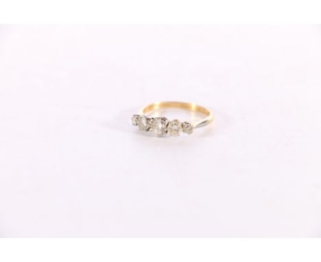 18ct gold and platinum diamond five stone dress ring, the central diamond approximately 0.3ct, flanked by two sub 0.2ct stone