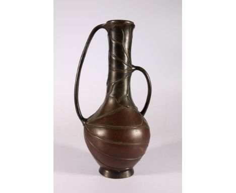 Japanese bronze twin handled vase of bottle shape, the body formed from lily pads, the handles from stems, Meiji/Taisho, 35.5