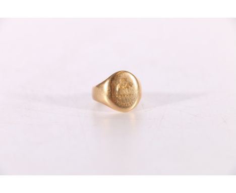 18ct yellow gold signet ring with intaglio seal depicting elephant, size G, 6.4g 