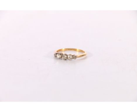 18ct gold diamond five stone ring, the central diamond just over 0.1ct, size P, 2.3g.Largest diamond 3.5mm, middle 2.5mm, sma