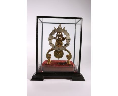 Late 19th century brass skeleton clock under glass "dome", case height 34cm tall Doesn't appear to be working but appears com