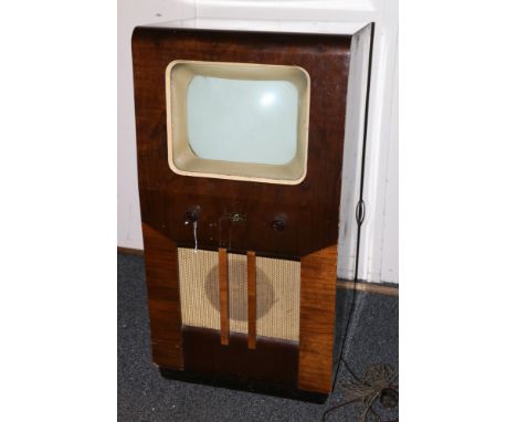 Columbia free standing television set, the body with gilt speaker cover and a screen. 