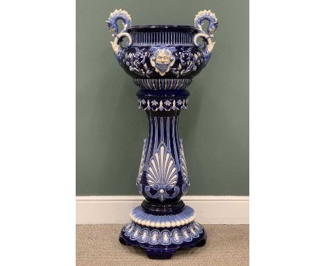 POTTERY PLANTER WITH STAND with leaf decoration throughout and seahorse handles to the planter, 121 (h) x 55cms (diam.)Proven