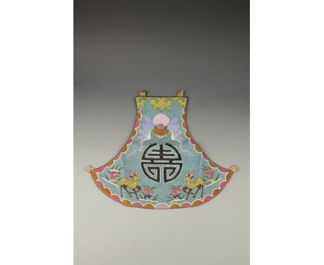 THE APRON OF A MILLION EYES: A TREASURE FROM THE EMPRESS DOWAGER'S WARDROBE: AN IMPORTANT CHINESE NYONYA BEADWORK CEREMONIAL 