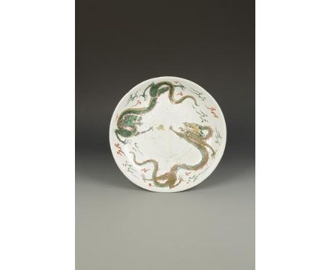 A CHINESE FAMILLE VERTE CHARGER decorated with two opposing dragons, Chenghua mark, Kangxi, 13.75" (35cm) dia. Provenance: Th