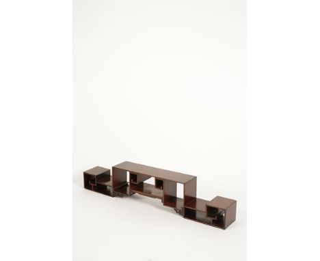 A CHINESE HARDWOOD SCROLL-FORM STAND, probably Hongmu,of symmetrical form with a central raised area flanked by lower ends, l