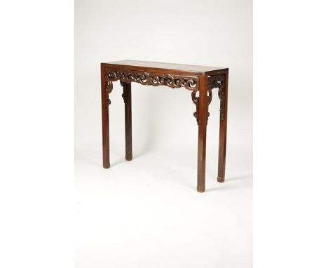 A CHINESE HARDWOOD CORNER-LEG HIGH SIDE TABLE, probably hongmu, the top inset with a panel of lighter timber, above an open f