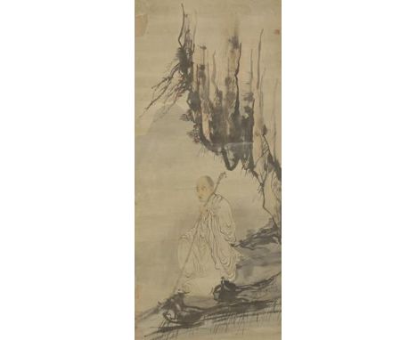 XINXIU SHANGCHAN (late Qing-Republic) A monk holding a stick sitting under rocks, ink and colour on paper, hanging scroll, ma