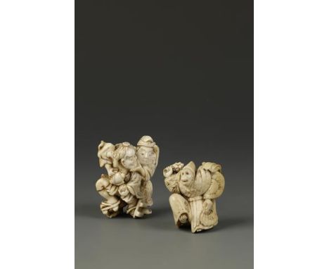 TWO JAPANESE IVORY NETSUKE, one of a monkey-performer with inlaid amber eyes, late Edo, 1.75" (4.5cm) high; the other of two 