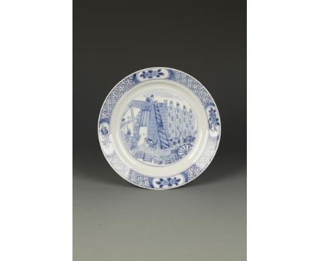 A CHINESE BLUE AND WHITE 'ROTTERDAM RIOT' SAUCER DISH, the centre decorated with a scene from the event, within a diaper bord