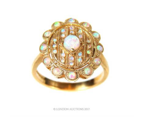 A 9ct gold opal Art Deco design plaque ring, Size P. 