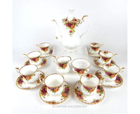 A Royal Albert 'Old Country Roses' pattern tea service for six people comprising six cups, saucers, a milk jug, a coffee pot