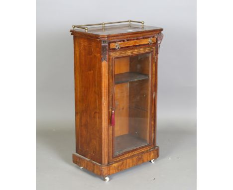 A late Victorian walnut and amboyna crossbanded music cabinet, height 100cm, width 56cm, depth 34cm.Buyer’s Premium 29.4% (in