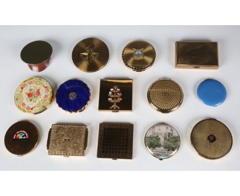 A group of fourteen, mainly mid-20th century, gilt metal compacts, including a novelty compact in the form of a military cap.