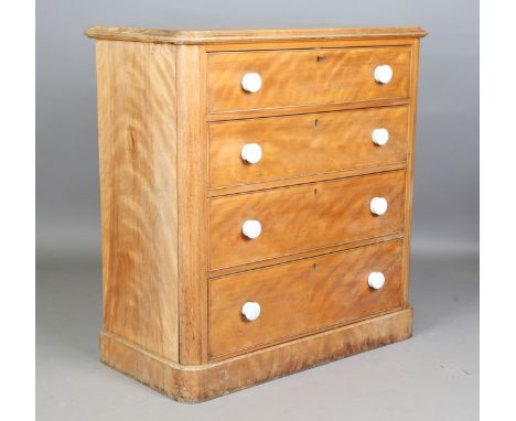 A Victorian satin walnut chest of drawers with white glazed ceramic handles, height 111cm, width 107cm, depth 53cm.Buyer’s Pr