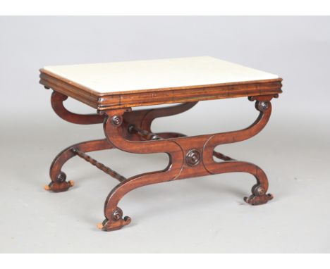 A Regency mahogany 'X' framed stand, the top inset with a later marble panel, height 44cm, length 68cm, depth 45cm.Buyer’s Pr