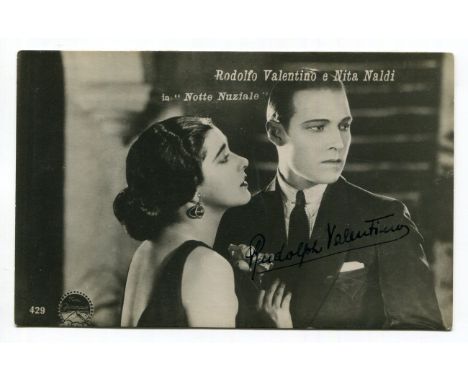 An autographed black and white photograph signed by Rudolph Valentino, depicting the actor and Nita Naldi in 'Notte Nuziale',