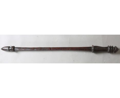 A Vanuatu dense hardwood pole club, Melanesia, the long flared shaft with triple ring turned head, length 108cm.Buyer’s Premi