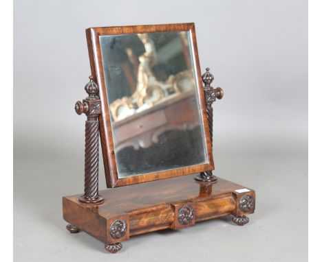An early Victorian mahogany swing frame mirror, fitted with two cushion frieze drawers, height 58cm, width 48cm, depth 24cm.B